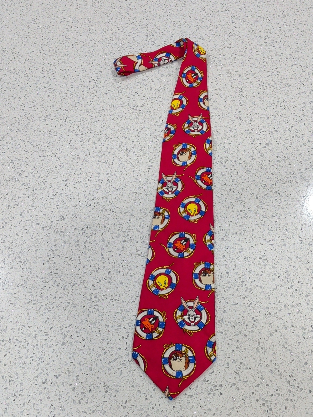 Warner Bros. Silk Red Men's Tie with Looney Tunes Character In Life Rings.